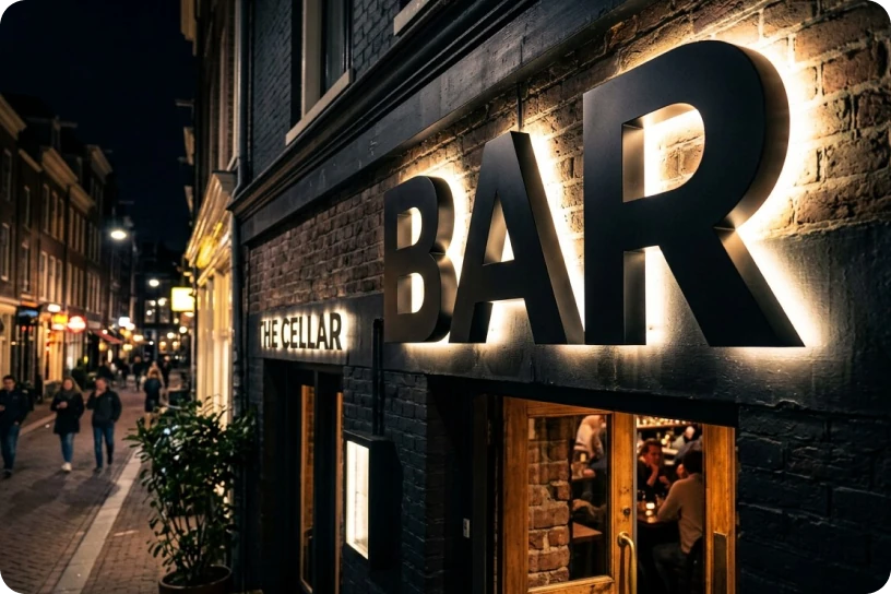 Чёрные буквы BAR с контражурной подсветкой